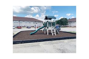 Mahomet apartment for rent - a playground with a jungle gym and a slide