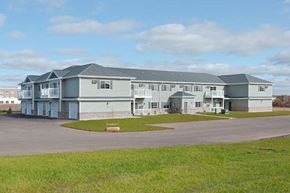 Fox Lake apartment for rent - a house with a parking lot in front of it