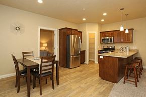 Sheboygan apartment for rent - a kitchen and dining room with a table and chairs