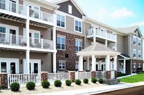 Beaver Dam apartment for rent - an apartment building with a porch and balconies