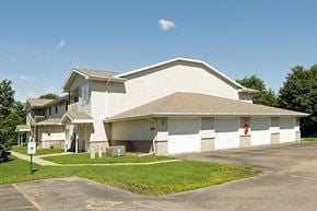Stevens Point apartment for rent - a white house with a lawn in front of it