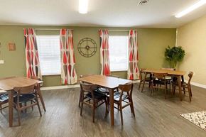 Grand Forks townhouse for rent - a dining room with tables and chairs