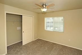 Rhinelander apartment for rent - an empty bedroom with a ceiling fan and a closet