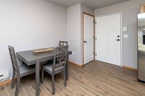 Onalaska apartment for rent - A kitchen with a table and chairs.