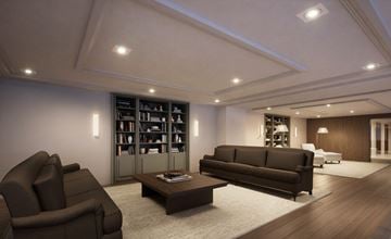 Reston apartment for rent - A modern living room with a dark brown sofa and a coffee table.