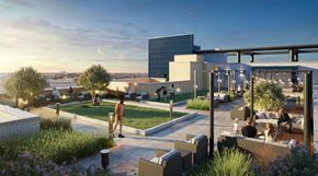 Rockville apartment for rent - A modern outdoor seating area with people enjoying the view.