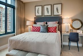 Rockville apartment for rent - a bedroom with a bed and a large window