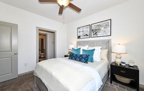 Mcdonough apartment for rent - Bedroom with bed, closet, ceiling fan at Carmel Vista, McDonough, GA, 30253