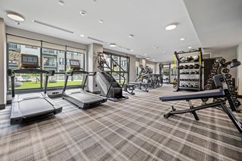 The gym at the enclave at woodbridge apartments in sugar land, tx