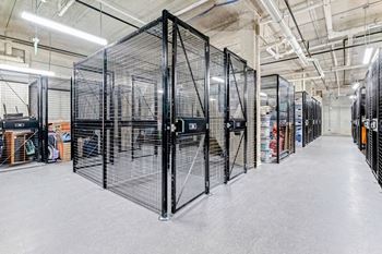 The inside of a cage enclosure in a warehouse