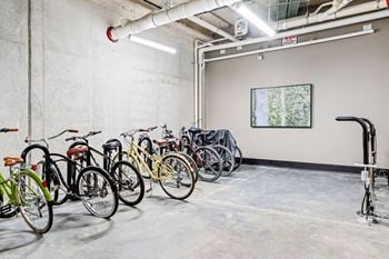 A bike rack with bicycles in a garage