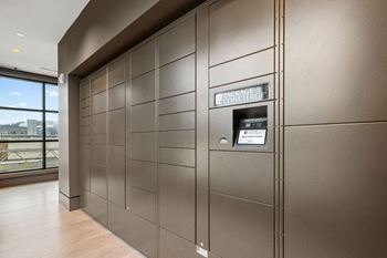 A wall of brown panels with a sign that says