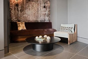 A living room with a couch and a coffee table