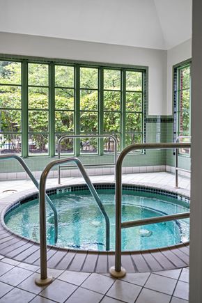 Lansdale apartment for rent - A small indoor pool with a metal railing.