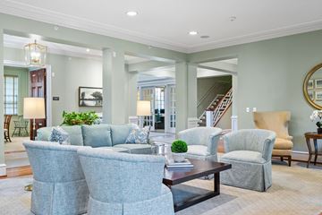 Lansdale apartment for rent - A living room with a grey couch and a coffee table.