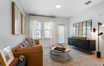 Orlando apartment for rent - a living room with a couch and a table