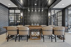 Newtown Square apartment for rent - a large table and chairs in a room with glass doors at The Harrison, Newtown Square, PA
