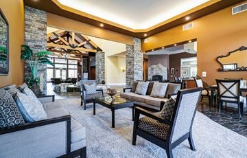 Puyallup apartment for rent - a living room with couches and chairs and a fireplace