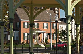 Baltimore apartment for rent - a view of a building from under a covered porch