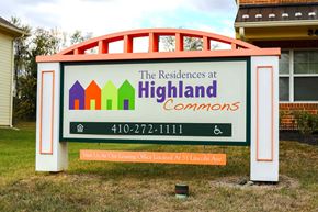 Aberdeen apartment for rent - A sign for The Residences at Highland Commons with a phone number and an arrow pointing to a leasing office.