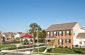 Baltimore apartment for rent - a group of houses in a neighborhood with a stop sign