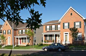 Baltimore apartment for rent - a car parked in front of a row of houses