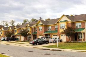 Aberdeen apartment for rent - A row of houses with cars parked in front.