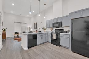 Richmond apartment for rent - Fully-equipped kitchens with sleek, modern appliances at Highland Terrace apartments located in Richmond's Highland Park neighborhood