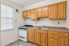 Towson apartment for rent - Kitchen at Park View at Towson with wood cabinets and modern appliances