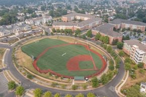 Baltimore apartment for rent - an aerial view of a baseball field with buildings in the background