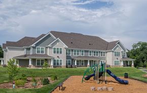 North East apartment for rent - a playground in front of a large house