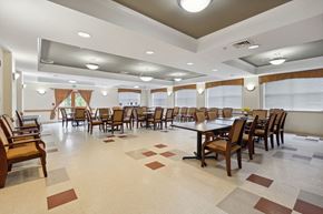Baltimore apartment for rent - a large dining room with a large table and chairs