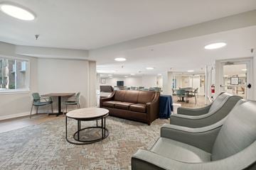 Columbia apartment for rent - a living room with couches and chairs and a table