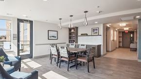 Washington apartment for rent - A dining room with a table set for six.