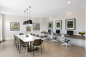 Silver Spring apartment for rent - A conference room with a long table and chairs.