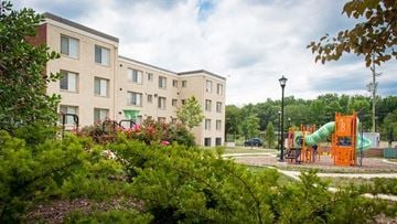 Washington apartment for rent - a childrens playground in front of a building