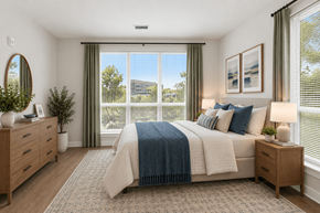 Columbia apartment for rent - A bedroom with a large bed and a view of the outside through the window.