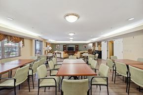 Columbia apartment for rent - a large room with tables and chairs and a fireplace