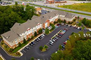 Severna Park apartment for rent - an aerial view of a building and parking lot