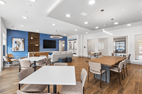 Columbia apartment for rent - A modern dining area with wooden tables and chairs.