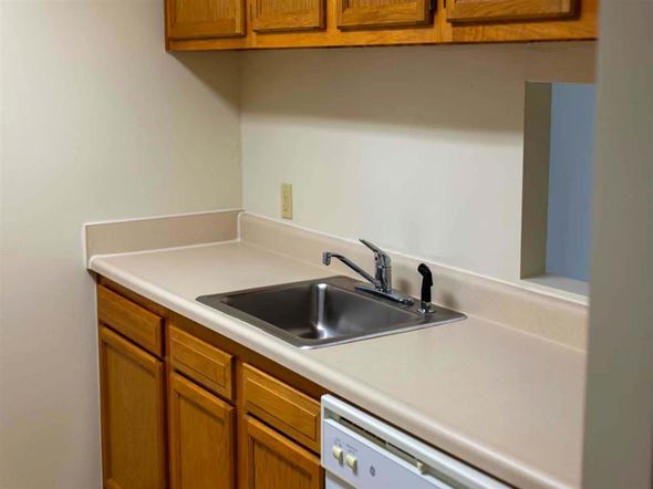 Annapolis apartment for rent - Well-appointed kitchen with ample cabinet space and modern appliances, part of a thoughtfully designed apartment at College Parkway Place, a family-friendly mid-rise community in historic Annapolis.
