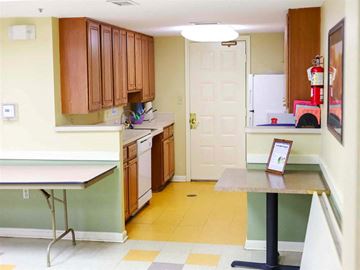 Catonsville apartment for rent - a kitchen with a table and a counter in it