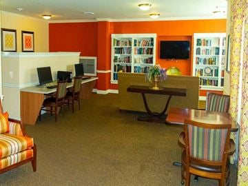 Dundalk apartment for rent - a living room with tables and chairs and a library