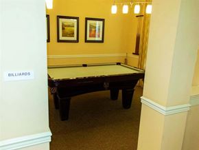 Dundalk apartment for rent - a pool table in a room with two pillars