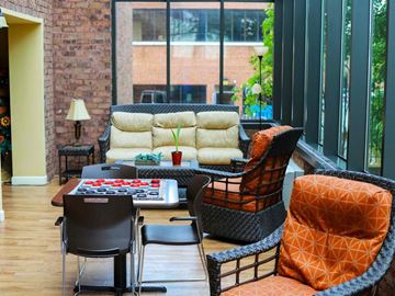 Westminster apartment for rent - a living room with a couch and chairs and a table