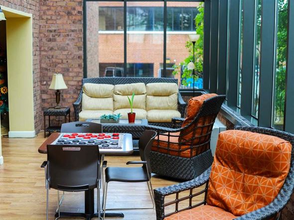 Westminster apartment for rent - a living room with a couch and chairs and a table