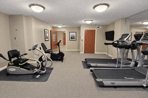 Randallstown apartment for rent - A gym with treadmills and exercise bikes.