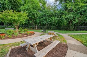 Alexandria apartment for rent - two picnic tables in a park with trees