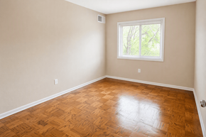 Washington apartment for rent - A room with a wooden floor and a window.