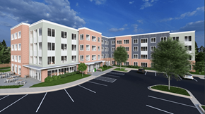Columbia apartment for rent - A large multi-story building with a parking lot in front.
